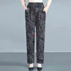 Pantalones de mujer cintura elástica estampado de flores favorecedoras pierna recta otoño e invierno elegante bolsillo delgado suelto