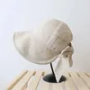 Berretti Cappello a secchiello Bowknot a tesa larga grande Solido Morbido cotone Lino Portatile Ragazze Panama Cap Estivo Estivo Beach Tour Cappucci di protezione solare