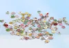 Images colorées100pcslot Styles conceptions mixtes médaillon flottant breloque en alliage breloques pour verre vivant médaillons bijoux DIY7948464