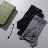 Sous-vêtements Designer Nouveaux sous-vêtements sans trace pour hommes Boxer Shorts Personnalité Angle plat Coton modal antibactérien absorbant la sueur respirant ZFE3