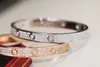 Designer pulseira 2024 ouro feminino aço inoxidável casal pulseira largura 7mm diamante dia dos namorados presente namorada jóias designer pulseira