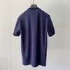 Top da uomo Polo bianca con ricamo rosso T-shirt da ufficio a maniche corte tinta unita Topstoney T-shirt da uomo slim Abbigliamento da uomo casual da uomo Polo M-2XL