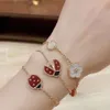 24SS Designer Van Cleff Armband VCAS FANJIA Armband Seven Star Ladybug Five Flower Female Thick Electropated Light Natural White Fritillaria Red