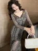 Casual Dresses Elegant Retro Maxi för kvinnor 2024 Plaidtryck Se genom Sheer Mesh Long Sleeve Ruffles Mermaid Robe Party Club Vestido