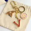 Eities Fashion Brand Letter Designer Keychains Metal Keychain Womens Bag Charm Pendant Auto Parts Car Key Chain with Gifts Box Dust Bag louiselies vittonlies
