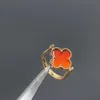 24SS Designer Van Cleff Armband VCAS Ny High Board Clover Flower Red Agate Laser för kvinnor Rosguld vände dubbelsidig ring