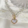Collane con ciondolo 2024 Elegante collana di perle di perle bianche imitazione Conchiglia di cristallo a forma di cuore per le donne Gioielli per feste di nozze dolci