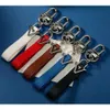 Echt lederen sleutelhangers Autosleutelhanger Modehanger Merkring voor mannen Dames Designersleutelhanger Leuke kerstcadeaus hebben originele doos louiselies vittonlies