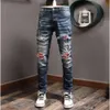 "Men's Designer Purple Stacked Jeans with Classic Embroidery and Motorcycle Hole Detailing - Slim Fit Denim Pants for Fashionable Streetwear (XXL)"
