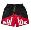 Designer Mens Shorts Rhude Short Kid broderie Pocket Unisexe Summer Street Hip Hop Lettre polyvalente Couples Jogging Breathable