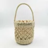 Shoulder Bags ollow Women andbag Summer Woven Bucket Beac Bag andmade Female Straw Boemian Tote Kniing Top-andle Mes BasketH24218