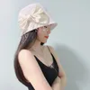 Berets 2024 design de luxo fino respirável chapéu de malha mulheres arco strass borla proteção solar balde de verão boné de tricô