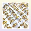 100pcs/lot Laser Cutting Rings for Women Styles Mix Gold Stainless Steel Charm Ring Girls Birthday Party Favor Female Beauul Jewelry Wholeale lots7769615