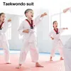 Vêtements ethniques 2024 Costumes TKD unisexes Blanc à manches longues Taekwondo Uniforme WTF Karaté Judo Dobok Suituit Enfants Adultes Gi Uniformes