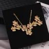 Ensemble de boucles d'oreilles et collier à trois fleurs, japonais et coréen, créatif, à la mode, luxueux, entièrement incrusté de zircon, bijoux floraux féminins