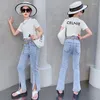 Set di abbigliamento Abbigliamento per ragazze T-shirt a maniche corte Jeans a vita alta 2 pezzi Pantaloni estivi con taglio a stivaletto Abiti Tuta per bambini