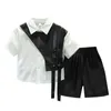 Ensemble pour enfants garçons à la mode patchwork noir et blanc chemise de bébé à simple boutonnage belle rue deux pièces de nouveaux vêtements d'été 240218