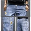 Jeans masculinos 2024 primavera preto azul carga homens streetwear denim jogger calças baggy harem jean calças plus size 5xl