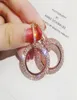 Designer Creative Earring Highgrade Elegant Crystal Earrings Round Gold and Silverörhängen Bröllopsfestörhängen för Woman6384719
