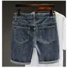 Fritid japansk koreansk sommar mörkblå rak ben denim shorts för mäns smal passform och kulslösa ungdomshorts fabrikspris