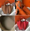 Moda clássica de designer bolsa de trava de couro bolsa de cesta de cesta de cesta de couro para mulheres para mulheres bolsas de luxo de luxo de luxo de couro genuíno de couro jyuiimn