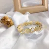 Bracciale rigido da donna alla moda, placcato in oro 18 carati, boutique di gioielli, design classico, regali d'amore di alta qualità