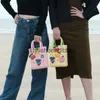 Totes Eva Charms Beach Bag gummi vattentät kvinnlig axel handväska mode crossbody messenger rese pool kvinnor jibz tote bogg bagh24219