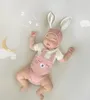 Mamelucos 5631B Ropa nacida Bebé Lindo Body con sombrero 2024 Moda de verano Niño de una pieza Conejo Escalada