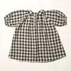 Retro Black Plaid Summer Girls Dress 2023 Doll Doll Flar Casual Cotton Puff Rleeve Sukienki z kieszeniami TZ241 240126