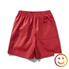 Shorts masculinos couro preto vermelho verde borad bolsos 2024 verão homens mulheres de alta qualidade amarelo cordão praia shortpant calças