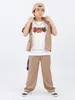 Stage Wear Popping Street Dance-kleding voor kinderen Trendy Cool Kid Adult Shirt met korte mouwen Broek Set Locking Explosief Hip Hop-kostuum