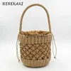 Shoulder Bags ollow Women andbag Summer Woven Bucket Beac Bag andmade Female Straw Boemian Tote Kniing Top-andle Mes BasketH24218