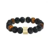 Bracelets de charme 10mm rétro noir agate pierre ronde bracelet homme naturel oeil de tigre perles bijoux de luxe pour femmes hommes bracelet