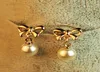 Kisswife New Shapeshift Stud Earring Bow Pearl Earrings Accessories Pearl Bow smycken gåvor5421945