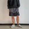 24SS Nuovi cortometraggi da uomo rhude pantaloncini da spiaggia traspiranti di alta qualità da donna di alta qualità pista casual mesh pantaloncini oversize pantaloncini da canale rhude pantaloncini us-xl