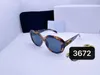 Occhiali da sole firmati Fashion Luxury per occhiali da donna da uomo stessi occhiali da sole pilota di Lisa Triomphe beach street photo piccoli sunnies metallo full frame con box3672