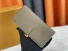 Högkvalitativ kvinnors designer plånböcker Luxurys vertikala mynt pursar klassiska blomma långa korthållare taurillon damer mode liten koppling väska med låda m81499