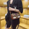 Bolso de marca de diseño para mujer, bandolera estampada de gama alta, bolsos de hombro tipo bandolera portátiles informales y versátiles