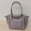 Francese Longxgfhiang Crossbhfody Mini palmare una spalla Mini nylon gnocco Graffiti versione corretta da donna di alta qualità