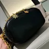 Yüksek kaliteli tasarımcı kadın omuz çantası moda elmas kafes zinciri lüks crossbody çanta fransız marka çift mektup orijinal deri hobo alt koltuk çantası