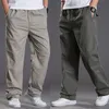 Mens casual Cargo Cotton pants men pocket loose Straight Pants Elastic Work Trousers Brand Fit Joggers Male Super Large Size 6XL y240122
