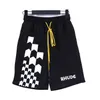 Nouveau RHUDE hommes respirant Shorts de plage hommes femmes décontracté maille piste respirant surdimensionné Rhude Shorts taille cordon Shorts livraison gratuite pour les shorts noirs US S-XL