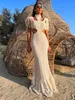 Robe sexy en dentelle blanche pour femmes, col roulé, manches à franges, taille nue ultra fine, manches longues creuses, plage d'été, robe tricotée 240219