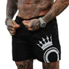 Mäns shorts herrbräda badkläder strand streetwear simning korta byxor baddräkter som kör sport surffande man