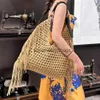 Shoulder Bags Rope Tassel Crochet Shoulder Bag Luxury Hollow Knitting Women Designer Handbags Handmade Woven Tote Bohemian Travel Beach BagsH24219