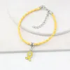 Nuovo arrivo all'ingrosso Bracciale per endometriosi Nastro giallo Bracciale con ciondoli Gioielli per la consapevolezza dell'endometriosi per i regali della Fondazione Cancer Center