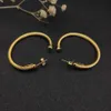 Brincos de joias de luxo com gancho dourado e fivela de arame torcido em prata esterlina com banhado a amarelo 14k