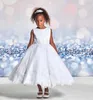 Robes de fille en Satin blanc fleur pour mariage dentelle Appliques enfants robes d'anniversaire longueur de thé petites filles première Communion