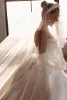 Abiti da sposa arabi Dubai Royal Ivory Satin Dubai Perline sexy Senza spalline Backless Increspato Abiti da sposa lunghi con fiocco grande Custom Madebc