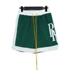 24SS Luxo RHUDE Shorts masculinos Respiráveis Praia Shorts basquete rua Mulheres Casual Malha Faixa Oversize Shorts Cintura Cordão Rhude shorts EUA Tamanho S-XL